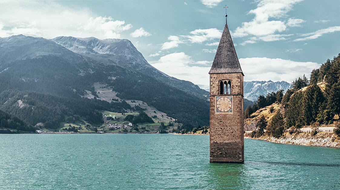 Kirchturm im Reschensee, Südtirol, Urlaub in Vinschgau mit AurumTours